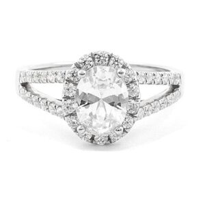 oval diamond with halo side stones and split band engagement ring
