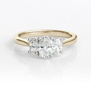 three stone oval diamond engagement ring